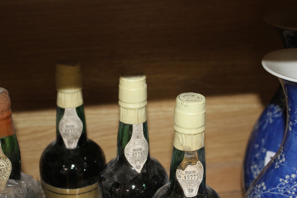 Three bottles of Reserva Bual medium sweet Madeira, two bottles of Verdelho Solera Madeira and a single of Cossarts Madeira
